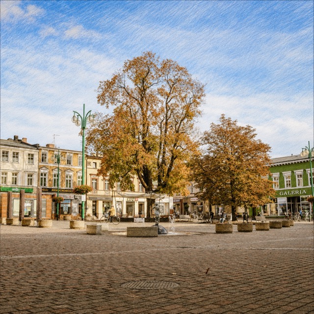 Rynek w Lublińcu z kamienicami i jesiennymi drzewami